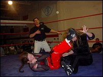 Even special guest referee Kevin Knight can feel the impact as Alicia plants Allison Danger almost through the mat with a running powerbomb!