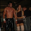 Alere Little Feather accompanies her man to the ring for a battle royal...