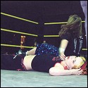 Luscious Lily leaves a broken and battered Noel lying on the mat after their match.