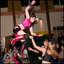 A flying cross-body from the top turnbuckle.