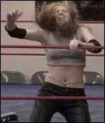 After being choked-out by the G.L.O.R.Y. Champion, a screaming Syren is roughly snapped back off the ropes.