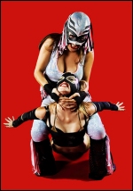 Masked Crybaby has her opponent suffering!