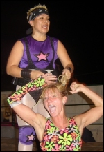 Polly Star's violent hairpull introduces Daizee to the rigors of the Mexican ring.