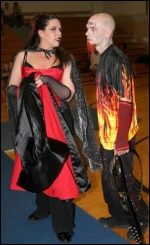 Samsara discusses strategy with her man before his match.