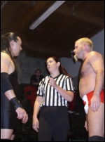 Ref McGraw can hold her own in the ring even when officiating matches between the big men.
