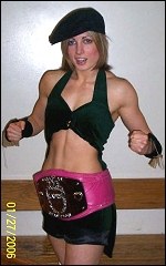 Rebecca proudly displays her title belt.