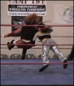 Sonya's bulldog works perfectly as Ariel is about to be smashed into the mat face-first.
