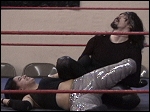 Ariel's brother Hades looks as if he's possessed. He's oblivious to his sister's screams of pain as he stretches her on the mat!