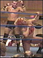 As Lady Victoria suffers on the ropes, Raza readies further punihsment for the blonde powerhouse.