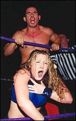 Tiny Tim is out of control as he chokes Mercedes on the ropes.