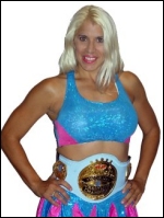 Hurricane proudly wears her NTW Women's Championship belt.