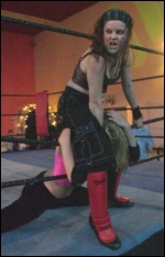 A vicious Eden Black strangles Jade over the middle rope. (Photo: Elisar Cabrera)