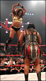 Tough in the ring: Bolt comes off the ropes with a big blow to Awesome Kong.