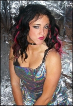 You can see the outrageous attitude just dripping from this young music and wrestling star!