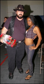Simply D'Vyne started in the wrestling business as <span style="font-style:italic;white-space:nowrap">Lady D</span>...valet of The Southern Enforcer.