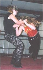 Zip does have a mean streak...as you can see from the way she uses her opponent's hair to toss her across the ring.
